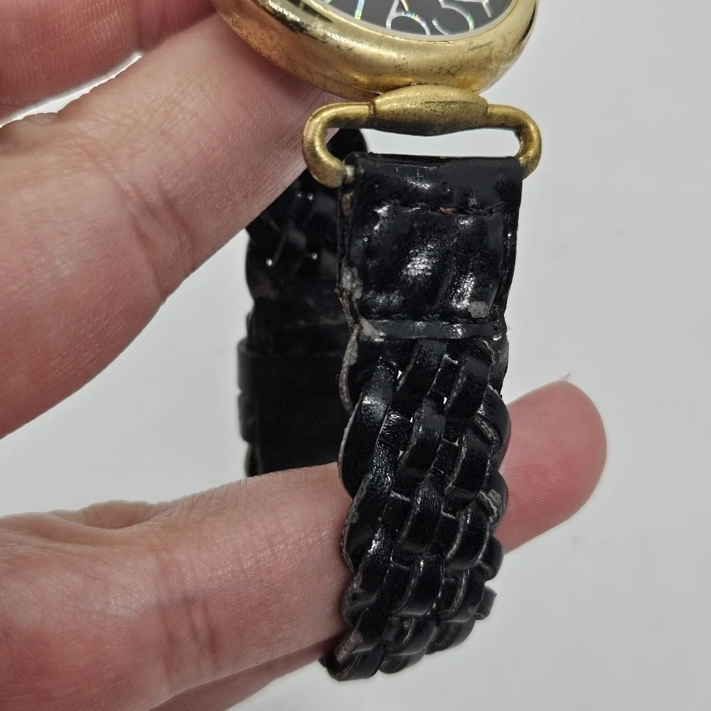vintage Avenue by Design black and gold tone watch with iridescent digits